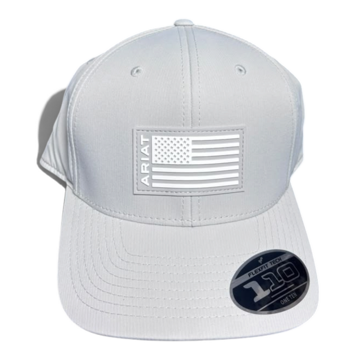 Cowboy City Western Wear grey structured cap featuring a white rubber American flag patch with Ariat branding.