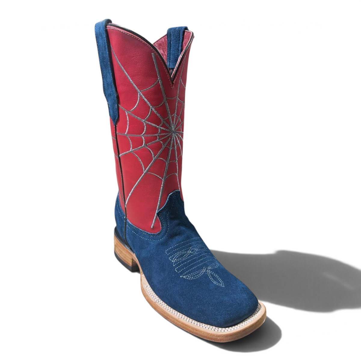 Cowboy City Western Wear blue suede cowboy boots with a red shaft featuring silver spiderweb stitching and square toe.