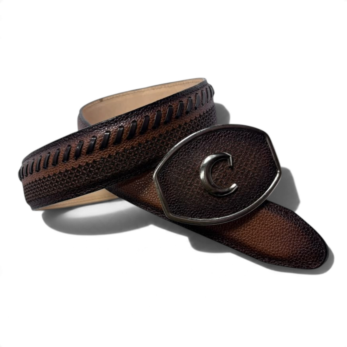Cowboy City Western Wear brandy leather belt with laser-tooled pattern and a buckle featuring a silver C logo