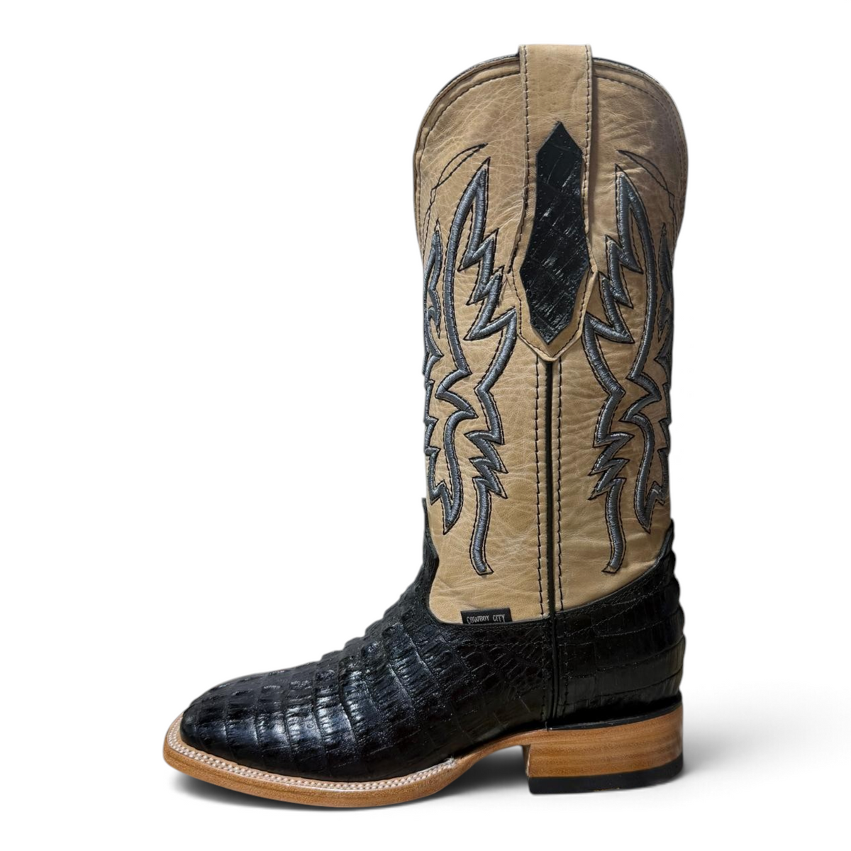 Cowboy City Western Wear The Maverick black square toe cowboy boots with tan leather shaft and caiman tail print.
