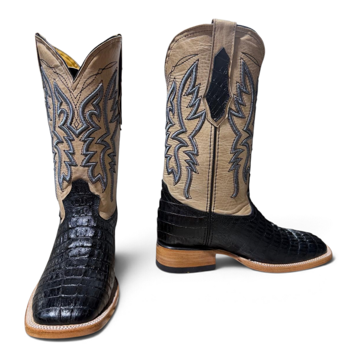 Cowboy City Western Wear The Maverick black caiman tail print square toe cowboy boots with tan leather shafts.