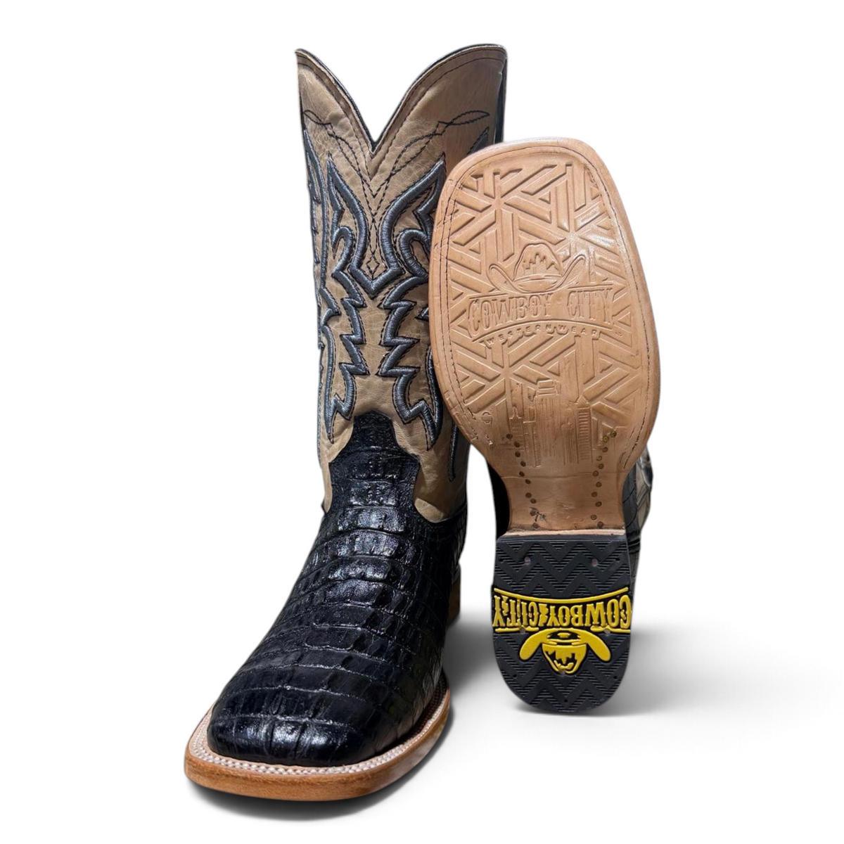 Cowboy City Western Wear Maverick square toe boots with black caiman tail print foot and tan leather shaft.