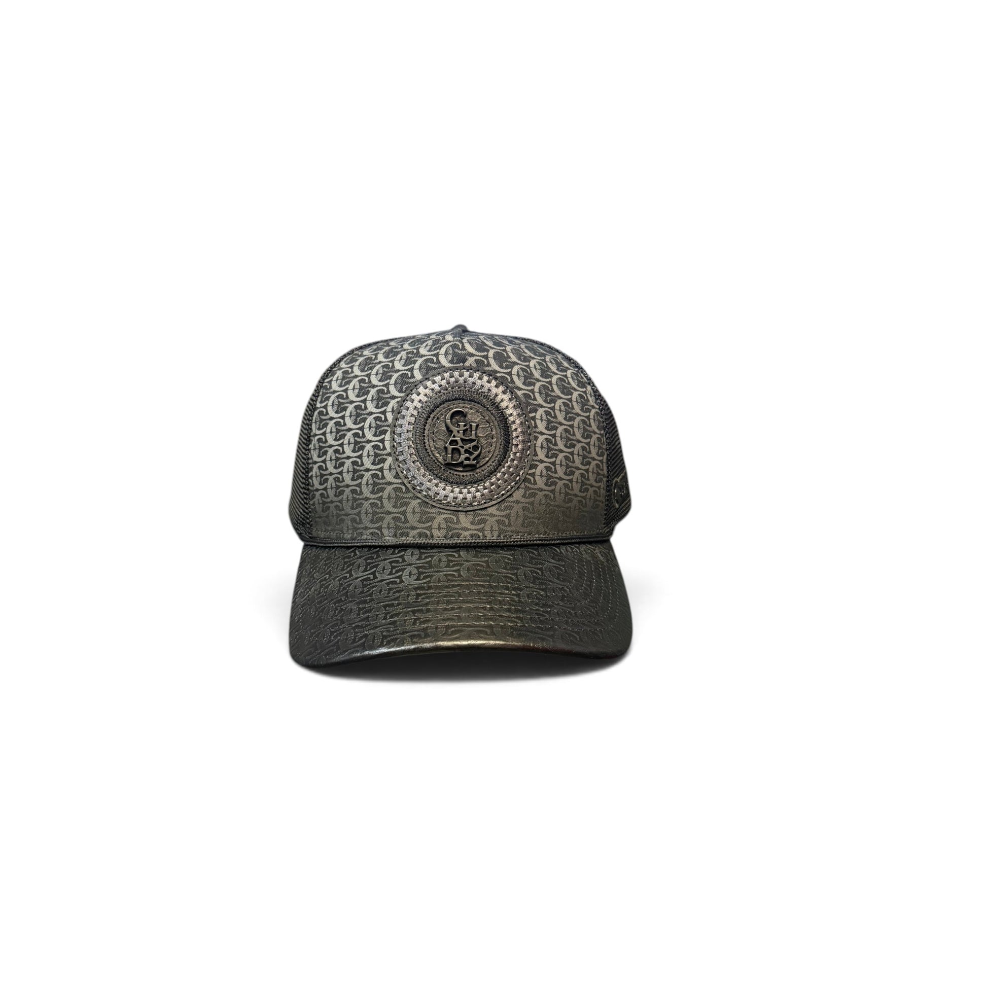 Cowboy City Western Wear black Cuadra snapback cap with a repeating logo pattern and central metallic emblem