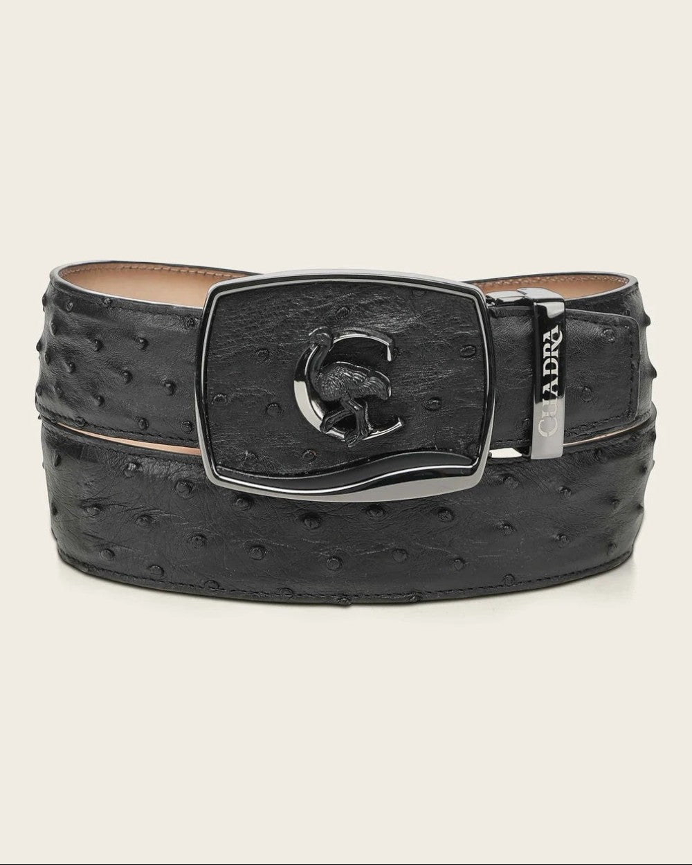 Cowboy City Western Wear black ostrich leather western belt with a retractable buckle and metal Cuadra monogram.