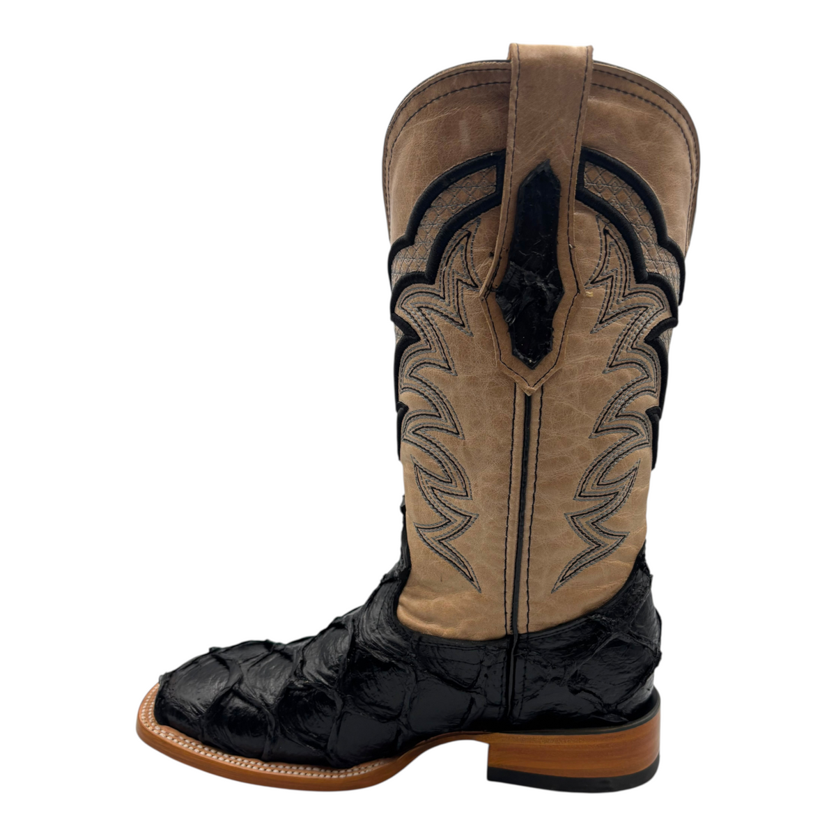 Cowboy City Western Wear men's western boot with black textured leather foot, tan shaft, and intricate embroidery.