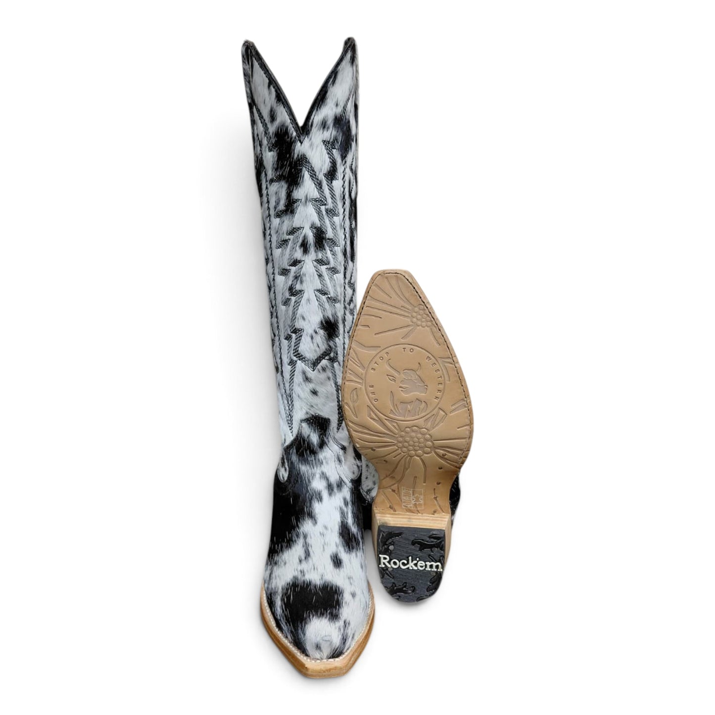 Cowboy City Western Wear tall cowhide snip toe cowgirl boots with black and white patterns and leather stacked heels.