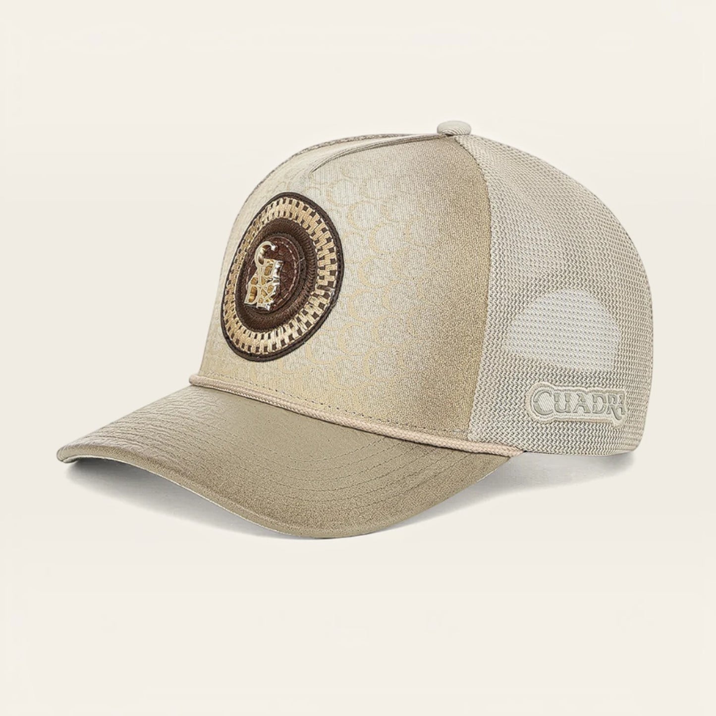 Cowboy City Western Wear Cuadra tan snapback cap featuring a leather front panel, mesh back, and embroidered logo patch.