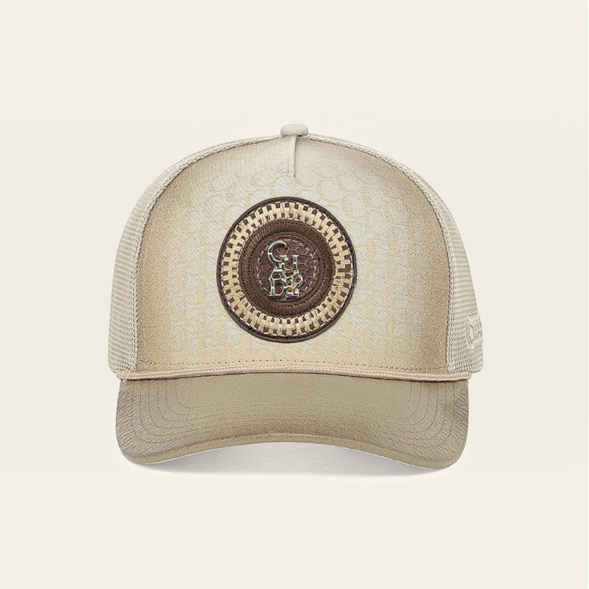 Cowboy City Western Wear Cuadra tan snapback cap with a structured leather front panel and signature logo patch.
